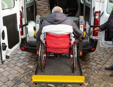 Accessible wheelchair minibus designed for physically disabled passengers with easy entry access and comfortable seating for safe and reliable transport.